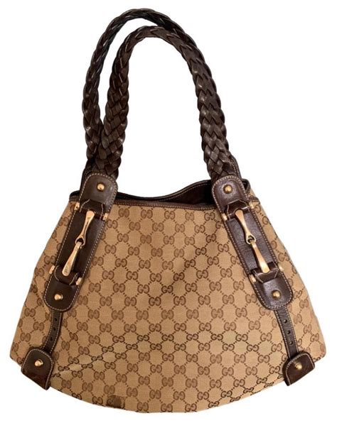 brown gucci black with braided straps|Gucci horse bit bag.